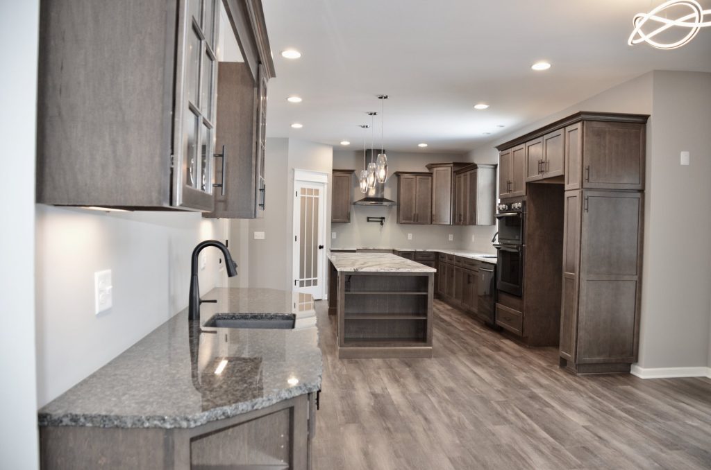 Bradford-Kitchen-with-Beverage-Station-Long-Island-Dark-Cabinetry-and-Open-Layout