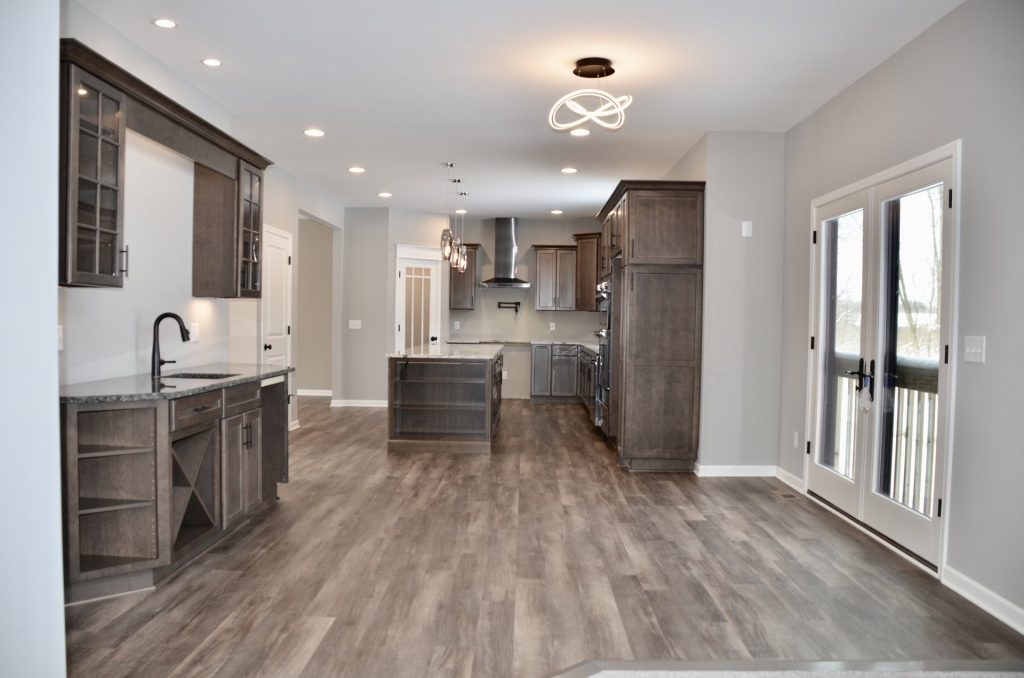 Bradford-Kitchen-and-Dinette-with-Beverage-Center-French-Doors-and-Wide-Plank-Flooring