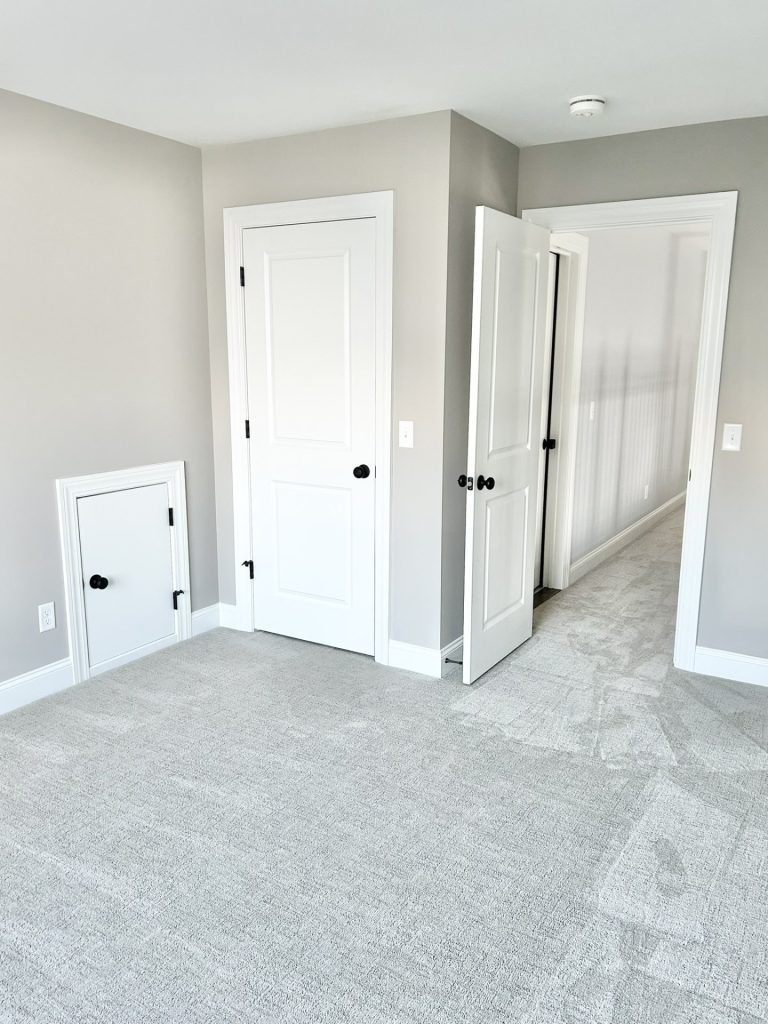 he Maple with Loft Bedroom with Neutral Carpet, White Doors, Hallway Entry & Light Gray Walls