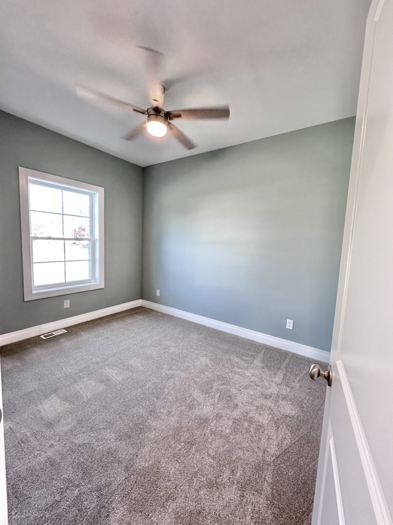 Bedroom-Teal-Green-and-Neutrals-with-Ceiling-Fan-Window