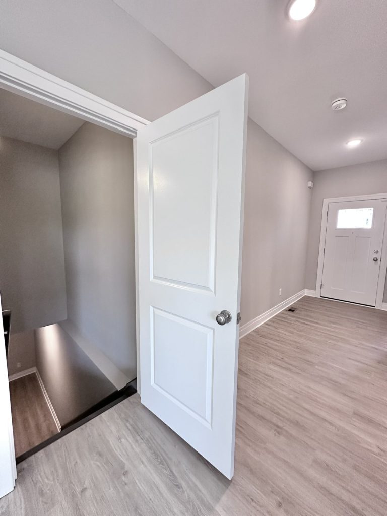 Entry-to-Finished-Lower-Level-in-Wood-Neutrals