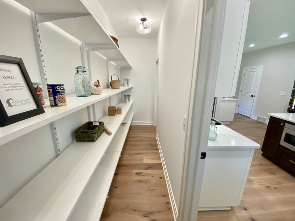 The Ruskin 2.0 Walk-In Pantry with Open Shelving, Decor Storage, Long Layout & Wood-Look Flooring