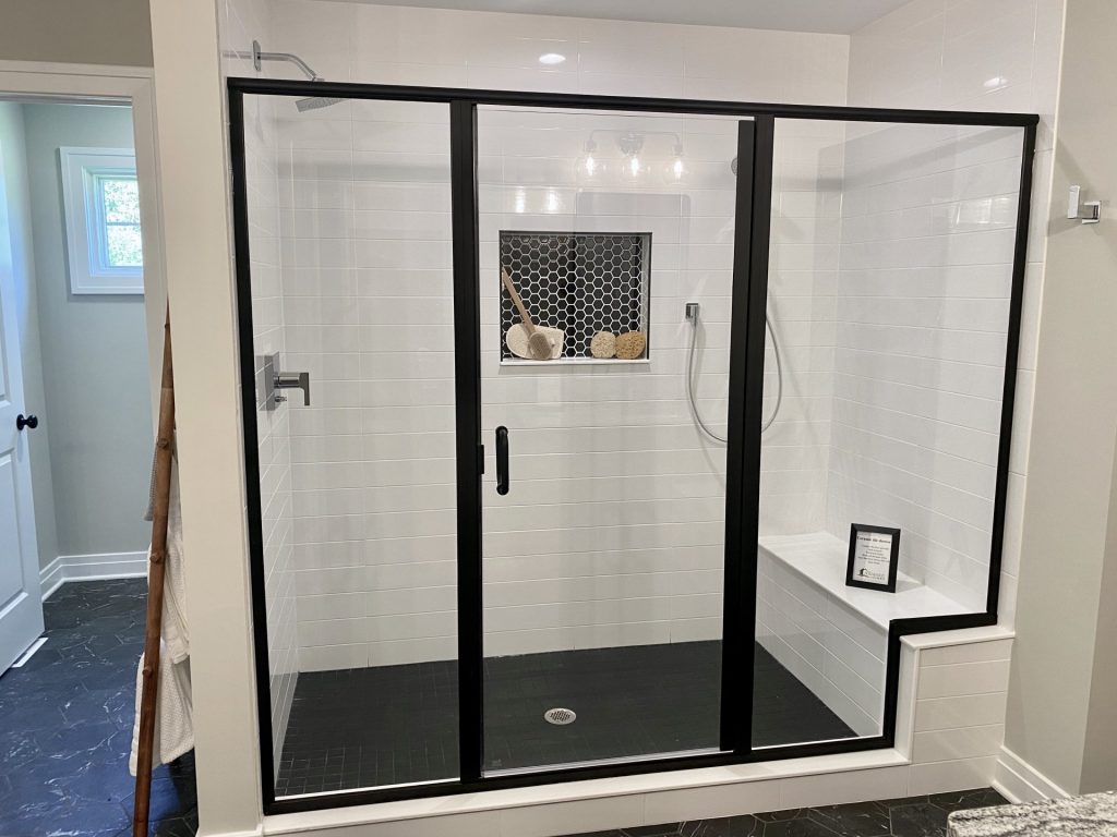 The Ruskin 2.0 Walk-In Shower with Black Framed Glass, Bench Seat, White Tile Walls & Built-In Nich