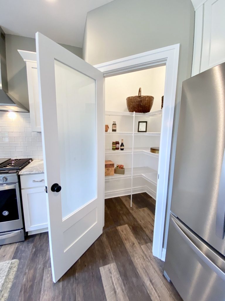 The Weston Walk-In Pantry with Frosted Glass Door, Wire Shelving, White Walls & Wood-Look Flooring