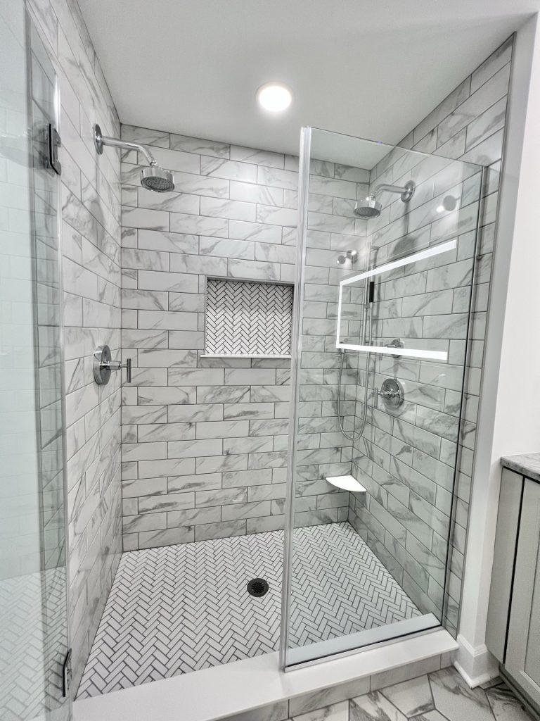 The Willow Master Bathroom Walk-in Shower with Dual Shower Heads, Marble Style Tile, Mosaic Niche