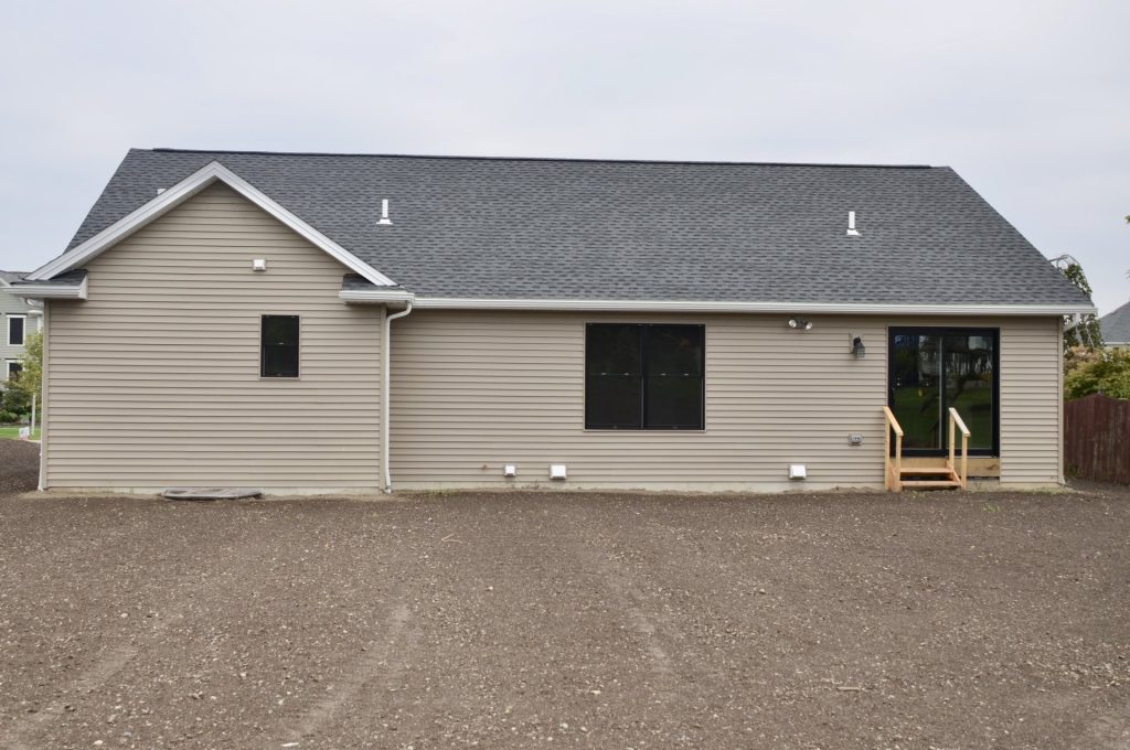 Baybrook-I-Rear-Elevation-with-Light-Siding-Sliding-Glass-Door-Backyard-Steps-and-Large-Windows
