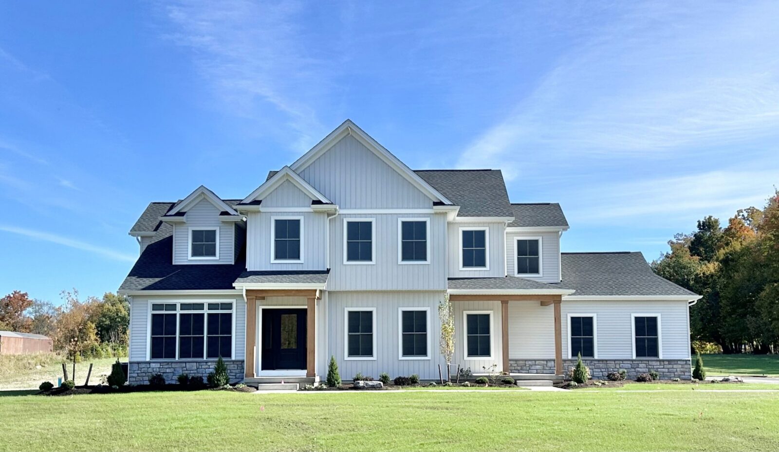 Exterior-Large-Craftsman-Inspired-Home-in-White-Neutrals