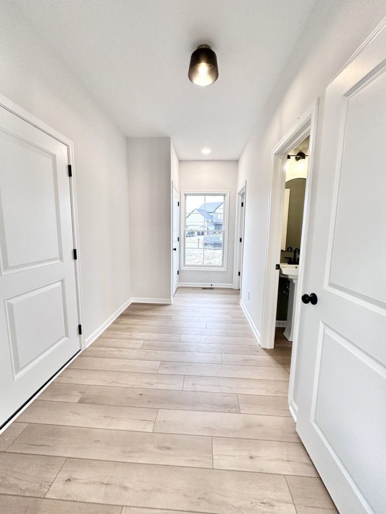 Cooper-First-Floor-Hallway-Wood-Look-Flooring-Window-Powder-Room