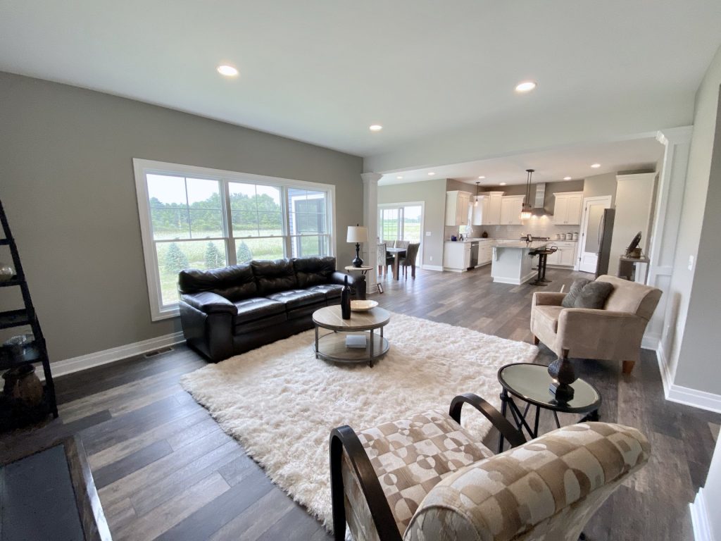 Weston-Open-Great-Room-with-Large-Windows-Seating-Area-and-Kitchen-View