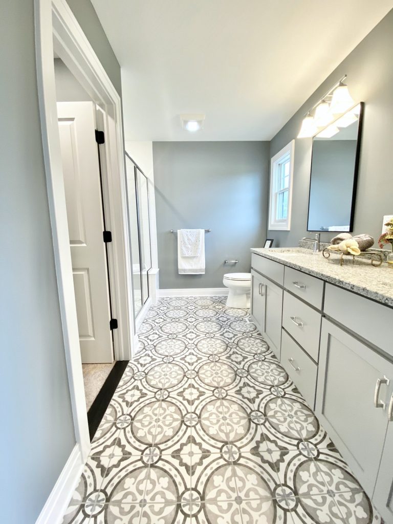 Weston-Primary-Bathroom-with-Double-Vanity-Patterned-Tile-Floor