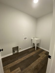 Kendall laundry area new home by Alliance Homes